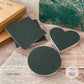 30 forest green colour mounts in a variety of shapes - circles, hearts and squares.